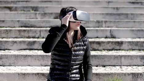 Focused-woman-in-VR-headset-on-street